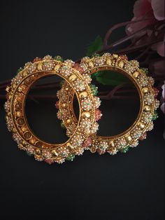 Handmade item Traditional Padmavati Kada Bangels in Multi-Color Rajwadi Bangles with High Quality Kundan/ AD Ruby Stones Indian Jewelry Rajwada Kada Inspired from the film Padmavat bangles with AD Stones ( American Diamonds ) ruby detailing in royal rajwadi style size Size Available 2.4, 2.6, 2.8 Fashion Empire Studio gives you new look, Made of high quality material(s). This is very Designer, Tradition Kada . Every Women wants Wear Something new and Stylish Items so this is only for u. Its A Ch Multicolor Hand Set Temple Jewelry Bangle, Fusion Meenakari Bangle For Festivals, Fusion Style Cutdana Bangle For Festivals, Festive Fusion Cutdana Bangle, Heavy Bangle For Navratri, Fusion Meenakari Bangle For Festive Season, Fusion Style Meenakari Bangle For Wedding, Fusion Cutdana Bangle For Diwali, Fusion Style Meenakari Bracelets For Festivals