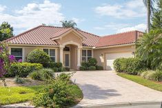 a house that has a driveway in front of it