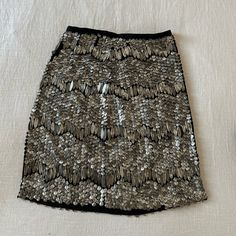 Fun Embellished, Fully Lined Skirt By Elie Tahari. Purchased At Saks Off 5th - Never Worn; Tags On. I’m 5’3 And This Hits About Knee Length. Note, One Sequin Is Loose On The Back. Festive Embellished Cocktail Skirt, Glamorous Embellished Pencil Skirt, Elegant Embellished Silver Skirt, Elegant Silver Embellished Skirt, Silver Sequined Mini Skirt For Evening, Glamorous Silver Embellished Skirt, Chic Embellished Festive Skirt, Festive Cocktail Skirt With Sequins, Festive Chic Embellished Skirt