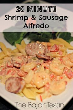 shrimp and sausage alfredo on a white plate with text overlay that reads 20 minute shrimp & sausage alfredo