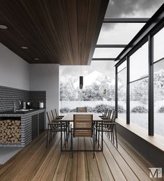 a table and chairs in a room with wood flooring on the outside side of it