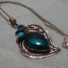 Artistic "Apatite, Turquoise & Blue Topaz" Handmade Copper Pendant On A 18" Chain #51b All Of My Jewelry Is Handmade By Me In My Smoke & Pet Free Home!!!!!! Please Note That Every Item Purchased Comes In A Drawstring Organza Bag For Easy Gift Giving!!! Please Note That I Will Consider Any Reasonable Offer On My Jewelry!!!!!!!!!! Please Let Me Know If You Have Any Further Questions. Thanks For Stopping By And Have A Terrific Day!!!! Blue Emerald Gemstone Necklace As Gift, Blue Emerald Gemstone Necklace For Gift, Handmade Elegant Apatite Necklace, Handmade Bohemian Emerald Necklace Gift, Handmade Turquoise Emerald Bohemian Necklace, Handmade Apatite Pendant Necklace, Handmade Turquoise Bohemian Emerald Necklace, Handmade Bohemian Emerald Pendant Necklace, Elegant Apatite Necklace As Gift