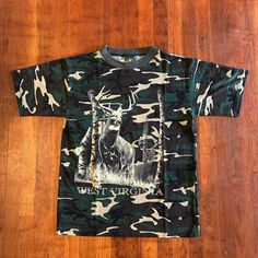 Dope camo hunting T-shirt from the '90s. Big graphic and spellout on front. Amazing condition. Fits like a Men's M (20.5x28.5).  Brand: Logotel Size: M Color: Multi Condition: Excellent Camouflage Graphic Print Tops For Outdoor, Camouflage Graphic Tee For Streetwear, Camo Baseball Shirt, Camouflage Crew Neck T-shirt With Letter Print, Camouflage Short Sleeve T-shirt For Streetwear, Camouflage Graphic Tee With Print, Camouflage Letter Print T-shirt For Streetwear, Cheap Camouflage Short Sleeve T-shirt, Streetwear Camouflage T-shirt With Letter Print