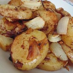 Roasted Potatoes and Onions - Easy and Delicious Recipe | Allrecipes Roasted Potatoes And Onions, Easy Potatoes, Healthy Breakfast Bowl, Potatoes And Onions, Potatoes Onions, Most Popular Recipes, Potato Dishes