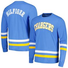 The Tommy Hilfiger Nolan Long Sleeve T-Shirt is the perfect way to show your unwavering support for the Los Angeles Chargers. This stylish tee features embroidered fabric applique and screen print graphics that proudly display the Chargers logo, a must-have for any dedicated fan. The comfortable cotton material ensures you'll stay comfortable while cheering on your team, whether you're at the stadium or watching from home. Long Sleeve Cotton T-shirt With Team Spirit, Blue Cotton T-shirt With Embroidered Logo, Blue College T-shirt With Embroidered Logo, Collegiate College Tops With Embroidered Logo, Collegiate Tops With Embroidered Logo For College, Blue Relaxed Fit T-shirt With Embroidered Logo, Spring Cotton Varsity T-shirt, Casual Blue Tops With Embroidered Logo, Sporty Spring Tops With Embroidered Logo