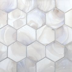 a white marble tile with hexagonal pattern