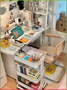 a desk with a chair, bookshelf and other items on it in a room