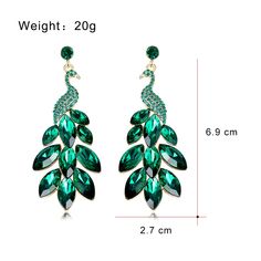 Material: Alloy Fashion Element: Phoenix Style: Personality Elegant Peacock Design Chandelier Earrings, Green Crystal Metal Earrings, Elegant Peacock Design Earrings For Party, Elegant Peacock-colored Earrings As A Gift, Elegant Peacock-colored Earrings For Gift, Elegant Peacock Colored Earrings For Gift, Green Peacock Design Drop Earrings, Peacock Design Dangle Earrings For Party, Elegant Peacock Colored Earrings For Wedding