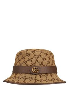 Bucket Hat For Men, Mens Bucket Hats, Versace Brand, All Over Pattern, Gucci Monogram, Ski Accessories, Gg Logo, Buy Gucci, Metal Logo