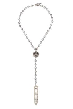 This Y necklace features 17” of silver Freshwater Pearls with silver wire, X and Sword & Crown pendant. Absolutely beautiful all by itself or layered with our other designs. Strand Length: Short, 17” Drop Length: Approx 7.5” Stone Size: 8 mm Sterling Silver Plated Each piece of French Kande is handmade in our Los Angeles studio by Californian artisans. Luxury Silver Pendant Lariat Necklace, Silver Long Lariat Necklace, Luxury Silver Lariat Necklace, Luxury Silver Sterling Lariat Necklace, Luxury Silver Sterling Silver Lariat Necklace, Luxury Long Drop Silver Necklace, French Kande, Picture Frame Hangers, Crown Pendant