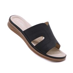 Walk with comfort and style in our Siketu Off the Coast Cushioned Flat Sandals. The perfect blend of fashion and practicality, these sandals provide cushioned support for your feet while boasting a trendy coastal look. Available in apricot, add a touch of whimsy to your summer wardrobe. Cheers to happy feet! 0.98'' heel Slip-on PU upper Synthetic Arch support footbed™ Cushioned Insole™ Anti-skid rubber sole Comfortable Black Slip-on Wedge Sandals, Black Slippers With Removable Insole For Vacation, Casual Black Slippers With Arch Support, Comfortable Black Slip-on Footbed Sandals, Black Slippers With Arch Support For Vacation, Black Beach Slippers With Arch Support, Black Slippers With Arch Support, Comfortable Black Sandals With Round Toe, Comfortable Black Casual Wedge Sandals