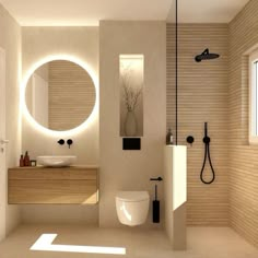 a bathroom with a sink, toilet and shower in it's center wall is illuminated by round mirrors