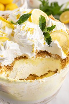 a dessert dish with lemons and whipped cream