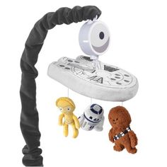 a star wars mobile with two stuffed animals hanging from it's side and an inflatable droid toy next to it