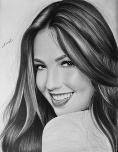 a drawing of a smiling woman with long hair