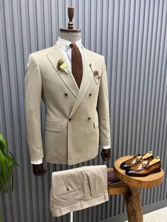 Introducing our Beige Striped Double Breasted Suit – a sophisticated and versatile choice for your formal wardrobe, designed by HolloMen. This impeccably tailored ensemble features a subtle striped pattern, adding a touch of contemporary refinement to the classic beige suit. From HolloMen Spring Summer Collection. Fabric: 63% Polyester, 34% Viscone, 3% Elastane. Features: Elegant beige color with subtle stripes for a distinguished appearance Double-breasted design for a polished and modern look Double Breasted Pinstripe Suit, Costume Beige, Beige Suit, Men's Business Suits, Beige Suits, Suit Material, Pinstripe Suit, Slim Fit Suit, Double Breasted Suit