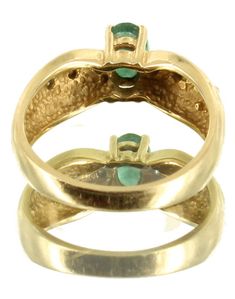 VINTAGE 14K GOLD .23CT OVAL COLUMBIAN EMERALD DIAMOND DRAPED PRETTY RING SIZE 6 Offered here is a vintage 14k gold .23ct oval Columbian Emerald and Diamond draped pretty ring in a size 6. The emerald has typical inclusions. The emerald is flanked by three 1.5mm SI clarity, GHI color diamonds on each side. Inside of the ring is stamped; 14K ADL This ring is in good sturdy condition, showing just normal wear. Weighs; 2.3dwt or .12g Please see our original photographs and use them as an extension o Oval Yellow Gold Emerald Ring With Multi-stone, Oval Yellow Gold Emerald Ring With Multiple Stones, Heirloom Gold Marquise Cut Emerald Ring, Heirloom Marquise Cut Gold Emerald Ring, Fine Jewelry Oval Birthstone Ring, Oval Emerald Ring Stamped 14k, Oval Emerald Ring Stamped 14k Gold, Gold Marquise Emerald Ring With Prong Setting, Gold Multi-stone Pear-shaped Ring