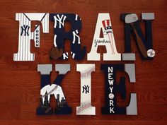 the letters are made up of baseball related items