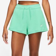 Pull on comfy vibes with the Nike NSW Rib Jersey Shorts. Designed to move freely, these shorts are made with cotton-blend fabric that keeps you cozy and relaxed all day long. 61% cotton/33% polyester/6% elastane. Imported. Nike NSW Rib Jersey Shorts - Women's - Spring Green / White. Comfortable Nike Bottoms With Built-in Shorts, Spring Cotton Athletic Shorts For Leisure, Green Cotton Shorts For Loungewear, Green Relaxed Fit Cotton Pajama Shorts, Green Cotton Loungewear Shorts, Nike Spring Activewear Shorts, Nike Spring Activewear, Spring Sportswear Shorts Relaxed Fit, Spring Sportswear Shorts With Relaxed Fit