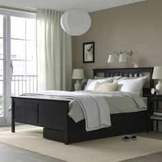 HEMNES bed frame with 2 storage boxes, black-brown/Lyngör white, King. Adjustable bed sides allow you to use mattresses of different thicknesses. Practical storage for an extra pillow, comforter or bedspread. Made of solid wood, which is a durable and warm natural material. The 4 large drawers give you an extra storage space under the bed. Leg/ Headboard/ Bedside/ Top rail/ Middle rail: Solid pine. Black Wood Bed Frame, Warming Blanket, Ikea Hemnes Bed, Bf List, Black Beds, Hemnes Bed, Bed Frame Legs, Black Bed Frame, Ikea Hemnes