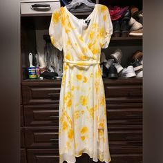 New With Tags! Absolutely Beautiful Yellow And White Dkny Midi Dress! Has Lining So Not Too Sheer; Notice Sleeve Detailing; Back Zipper; Tie At Waste. Yellow Fitted Midi Dress For Daytime, Fitted Yellow Midi Dress For Daytime, White Tennis Dress, Dkny Dress, Wrap Midi Dress, Sweater Dress Midi, Tennis Dress, Faux Wrap Dress, Mid Length Dresses