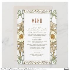 a menu card with flowers on it