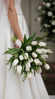 Minimalist Pure Bliss Tulip Wedding Bouquets White Tulips And Sunflowers, Tulips For Wedding Bouquets, Clean Classic Wedding, White Orchid Wedding Bouquet, Wedding Classic Decorations, Bouquets With Tulips, White Wedding Bouquets Elegant, Tulips Bouquet Wedding, White Tulip Wedding Bouquet