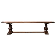 an old wooden table with two legs and one leg on the top, against a white background