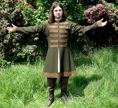 Viking coat for man is the basic outfit for a Scandinavian or Varangian warrior in the Early Middle Ages. It's made on the basis of finds from Birka - Swedish trade centre. It has two wedges on the sides and one on the back, making the circuit on the bottom bigger. Slightly tapered sleeves are sewn at right angles, with square underarm wedges, so they do not constrict movement. The coat has a machine stitching (invisible), and all visible stitching have been made manually. The coat is made of a Viking Coat, Coat For Man, Viking Man, Aged Clothing, Medieval Festival, Viking Men, Viking Costume, Russian Men, Early Medieval