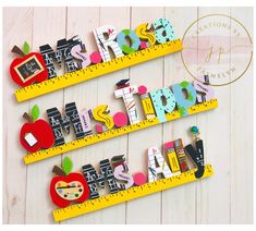 the letters are made out of different types of magnets, and each letter has an apple on it