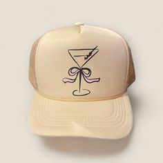 Add some "soft girl" vibes to your outfit with the Coquette Cocktails Trucker Hat. Perfect for sunny days, this khaki hat features adorable illustrations of your favorite drinks. Cheers to style and fun! Cute Beige Hats For Vacation, Cute Beige Hat For Vacation, Trendy Mini Hats For Summer Party, Trendy Brimmed Summer Trucker Hat, Casual Snapback Party Hat, Trendy Brimmed Trucker Hat For Summer, Trendy Cream Trucker Hat, Casual Mini Hats For Summer Party, Casual Summer Mini Hats For Party