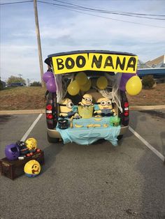 the back end of a car decorated with balloons and decorations for boo - nana