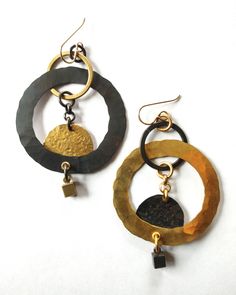 Elegant Gold Hoop Earrings With Oxidized Finish, Elegant Oxidized Brass Hoop Earrings, Elegant Brass Hoop Earrings With Oxidized Finish, Bronze Dangle Metal Earrings, Modern Round Brass Earrings, Elegant Bronze Metal Hoop Earrings, Elegant Bronze Copper Earrings, Gold Fusion Earrings With Oxidized Finish, Contemporary Metal Pierced Earrings