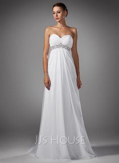 a woman in a white dress standing on a gray background with the words jh house com