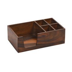 a wooden box that has compartments in it