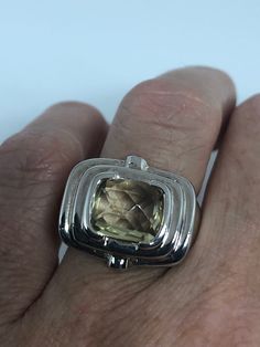 Vintage Citrine 925 Sterling Silver Gothic Ring Size 7 https://www.etsy.com/listing/749264453/vintage-citrine-925-sterling-silver?utm_source=crowdfire&utm_medium=api&utm_campaign=api Luxury Silver Topaz Ring With Citrine, Modern Silver Gemstone For Anniversary, Modern White Gold Topaz Ring As Gift, Silver Citrine Gemstones For Fine Jewelry, Formal Silver Citrine Jewelry, Silver Faceted Topaz Ring As A Gift, Elegant Silver Citrine Gemstones, Rectangular White Gold Topaz Ring For Gift, Rectangular Silver Gemstones For Gifts