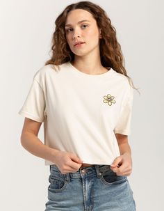 Jetty Daisy Crop Tee. Embroidered Daisy At Left Chest. Ribbed Crew Neckline. Short Sleeve. Cropped And Boxy Fit. 100% Cotton. Machine Wash. Imported. Model Is Wearing A Size Small. Model Measurements:height: 5'7" Bust: 29"waist: 22"hips: 34.5" Trendy Embroidered Short Sleeve Tops, Trendy Embroidered Relaxed Fit Tops, Spring Crew Neck Top With Embroidered Graphics, Trendy White Tops With Embroidered Graphics, Trendy Floral Embroidered Short Sleeve Tops, Trendy White Top With Embroidered Graphics, Trendy Short Sleeve Tops With Floral Embroidery, Casual Cotton Crop Top With Floral Embroidery, Spring Cotton Tops With Embroidered Graphics