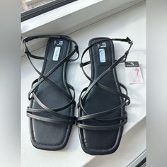 Brand New With Tags Black Sandals For Spring Day Out, Strappy Synthetic Sandals For Day Out, Black Strappy Synthetic Sandals, Casual Strappy Sandals For Evening, Casual Strappy Evening Sandals, Black Strappy Sandals For The Beach, Trendy Black Strappy Sandals, Chic Black Strappy Sandals, Brown Platform Sandals