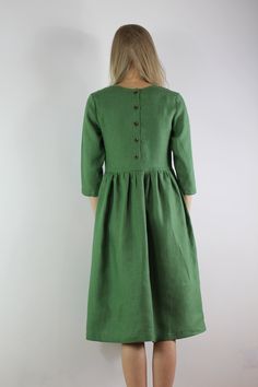 "Spring dress, Handmade greenl color linen dress with 3/4 long sleeves and 2 pockets , perfect for casual wear and suitable for any occasion in any season Details: - 100% natural linen produced in Europe ; - medium weight (180 gram per square meter); - color: green, could be any from our colors catalog (color samples at the photo); Made to order, approximately a few days, If you have any questions please message me and I will be glad to answer. Size guide : Size XS Bust: fits bust around 33\"-34 Elegant Linen Dress With 3/4 Sleeves, Green Linen Dress With Pockets, Green Relaxed Fit Linen Dress With Pockets, Fitted Green Linen Midi Dress, Green Midi Linen Dress, Green Relaxed Fit Linen Dress, Spring Linen Dress With Half Sleeves, Green Linen Knee-length Midi Dress, Green Linen Dress With Pockets For Spring