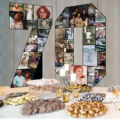 a table topped with lots of food next to a number seven sign filled with pictures