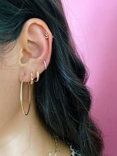 An everyday essential with gleaming flair. This dome shaped huggie earring is crafted in your choice of gleaming 14k yellow, rose, or white gold. Huggie width measures: 2.5mm Huggie height measures: 12mm Inner huggie diameter: 10mm Huggie Earrings Gold, Huggie Earring, Tiny Hoop Earrings, Types Of Earrings, Rose Gold Jewelry, Huggie Hoop Earrings, Minimalist Earrings, Huggies Earrings, Gold Material