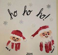 two handprints with santa claus and snowflakes on them, one has no hoo written on it