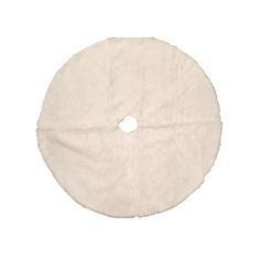 a white round pillow on a white background