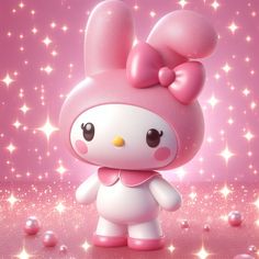 an adorable little hello kitty doll standing in front of pink background with stars and sparkles