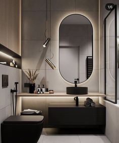 a bathroom with a large round mirror above the sink