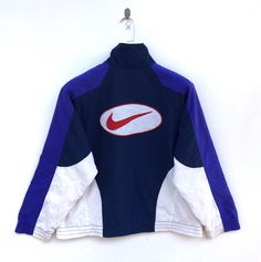 "PLEASE CONTACT TO ME WITH ANY QUESTION BEFORE BUYING.. PLEASE READ THE DESCRIPTION AND POLICIES BEFORE BUYING. TAG BRAND :- Nike SIZE ON TAG : Small ACTUAL SIZE MEASUREMENT :- ARM PIT TO ARM PIT :-23incher\" BACK COLLAR TO HEM:-23incher\" PLEASE COMPARE THE MEASUREMENT WITH YOUR GARMENT CONDITION :-8/10..A little small stain(Refer Pictures) MATERIAL : 100%Polyester COLOR:-View pic Kindly read my shipping and policies. SHIP WORLDWIDE VIA DHL GLOBAL MAIL. ⚫️Takes 14 working days to arrive. ⚫️Safe Urban Style Sports Windbreaker With Graphic Print, Sporty Windbreaker With Graphic Print For Streetwear, Sporty Windbreaker With Graphic Print, Sporty Graphic Print Windbreaker, Sporty Windbreaker With Graphic Print For Sports, Sporty Track Jacket With Graphic Print, White Track Jacket With Contrast Color For Streetwear, Winter Sports Track Jacket With Graphic Print, Urban Windbreaker With Contrast Color For Streetwear