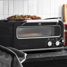 a toaster oven sitting on top of a counter