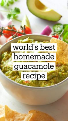 guacamole in a bowl with tortilla chips on the side