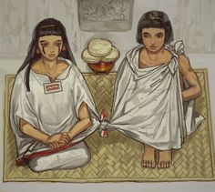 two women sitting on a mat with food in the background and one holding her hands behind her back