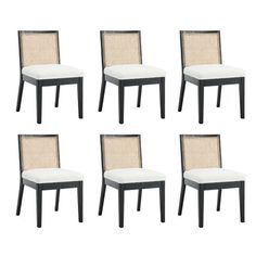 six black and white chairs with cane back